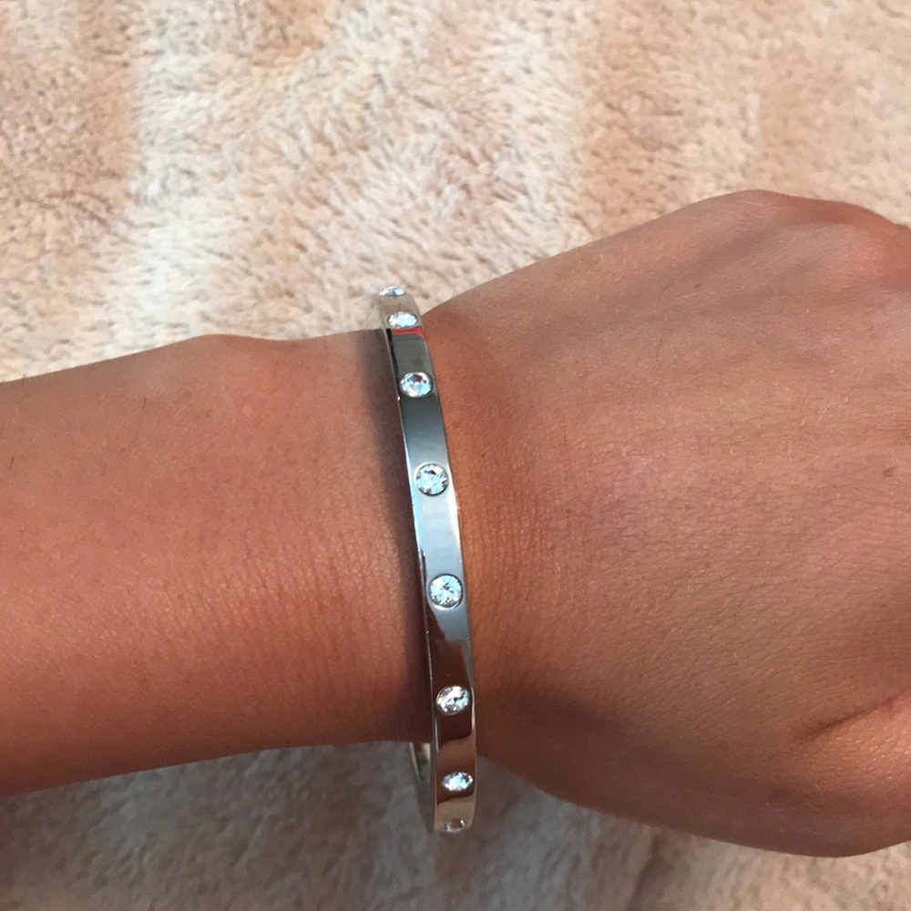 Coach Silver bangle with diamond studs all around